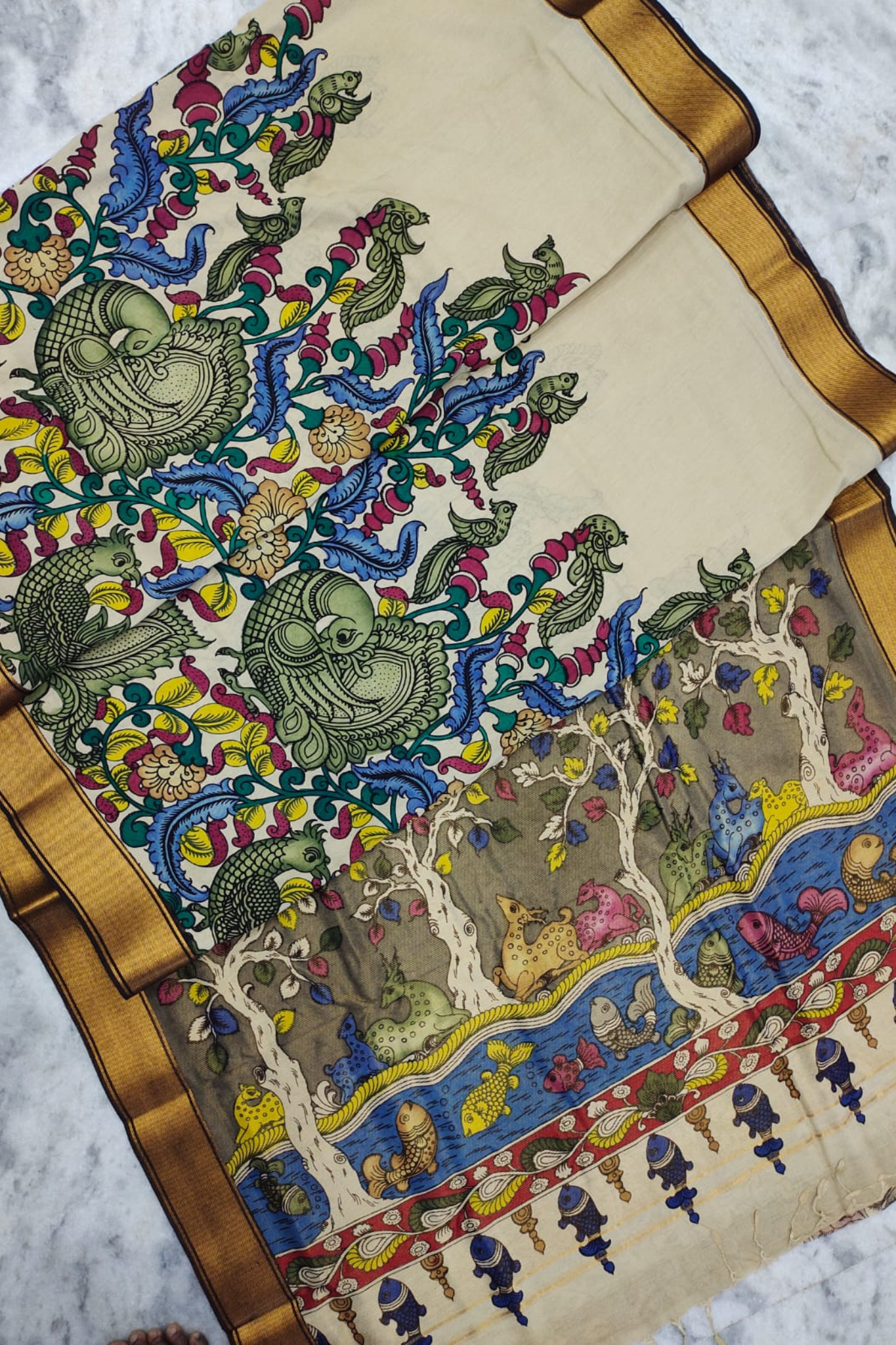 Handpainted Pen Kalamkari Silk Saree with Mythical Faces & Aquatic Motifs