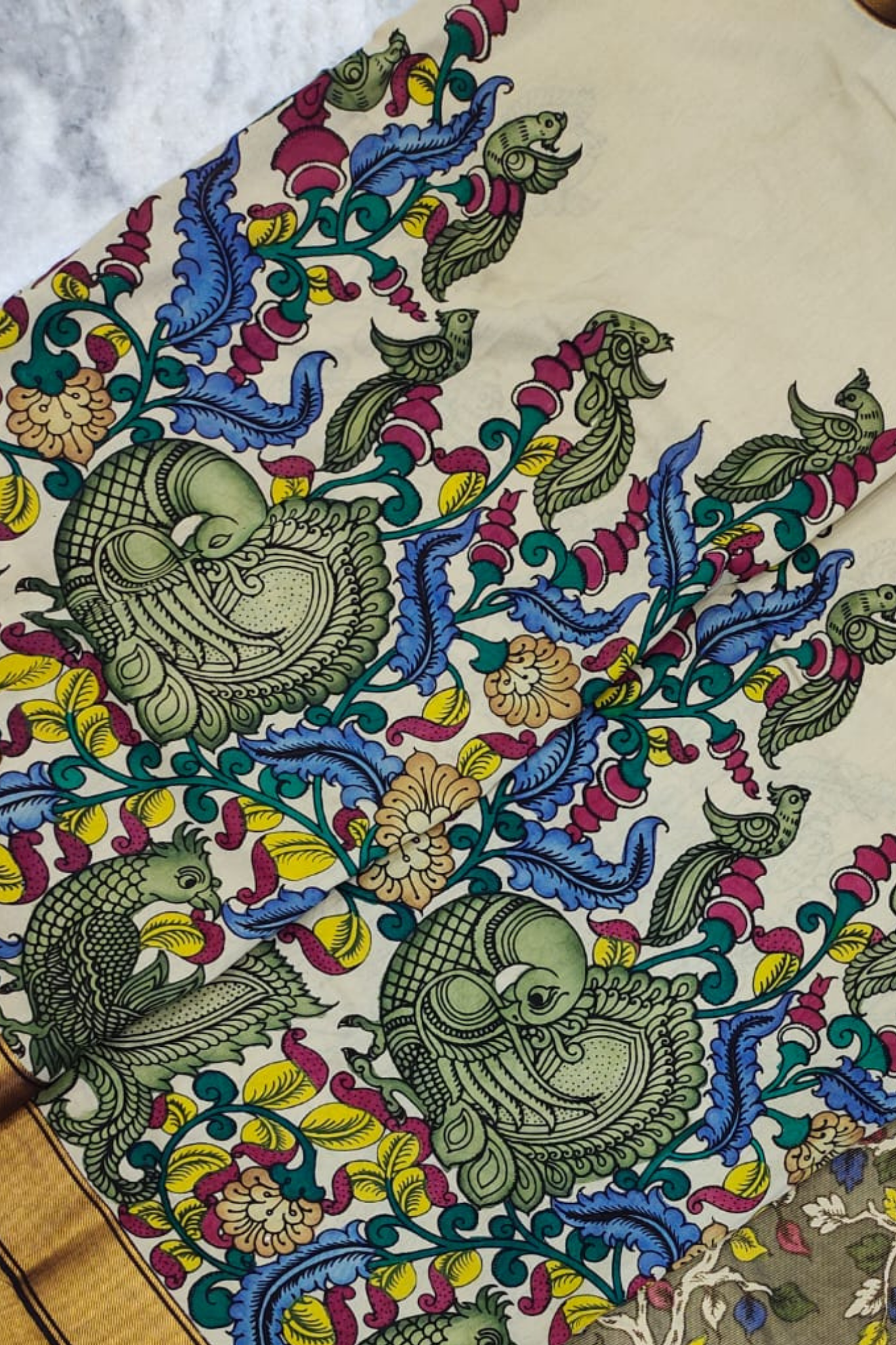 Handpainted Pen Kalamkari Silk Saree with Mythical Faces & Aquatic Motifs