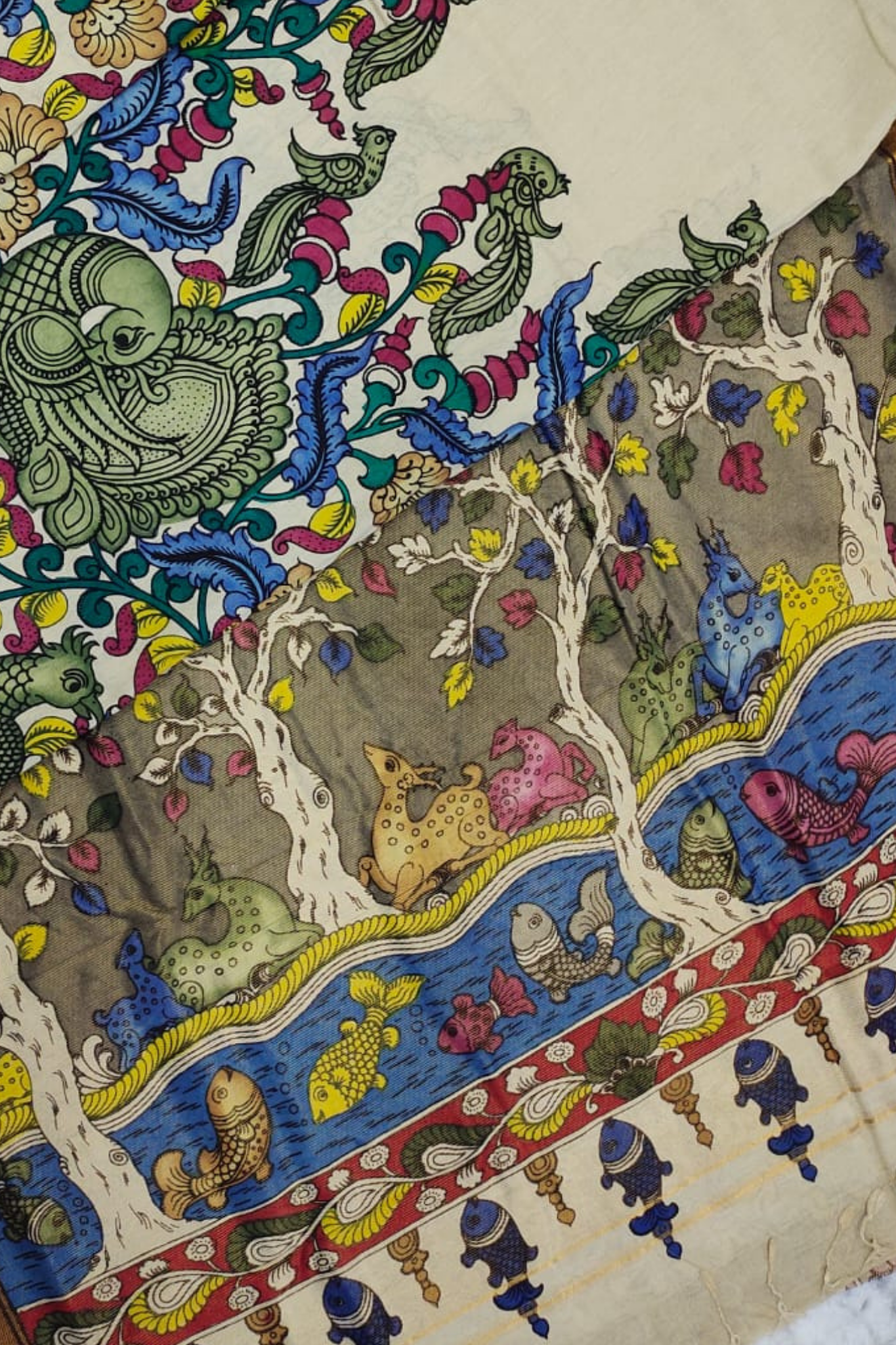 Handpainted Pen Kalamkari Silk Saree with Mythical Faces & Aquatic Motifs