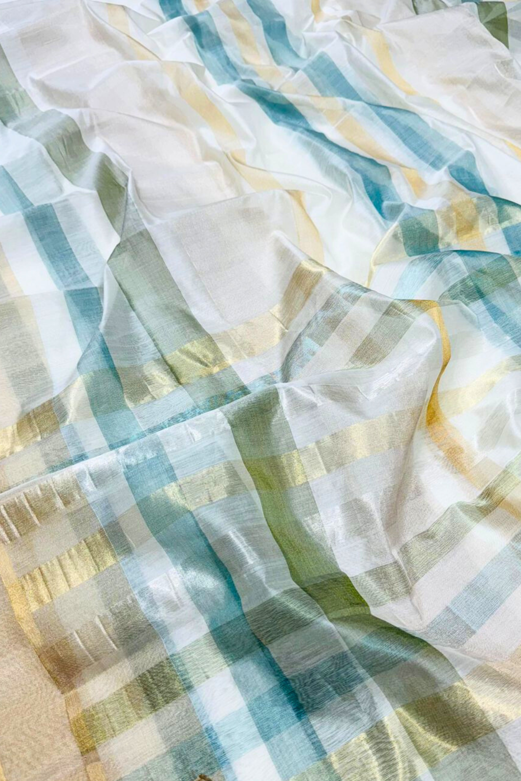 White Base With Blue And Gold Stripes Handweaved Rich Tissue Pure Silk Sarees