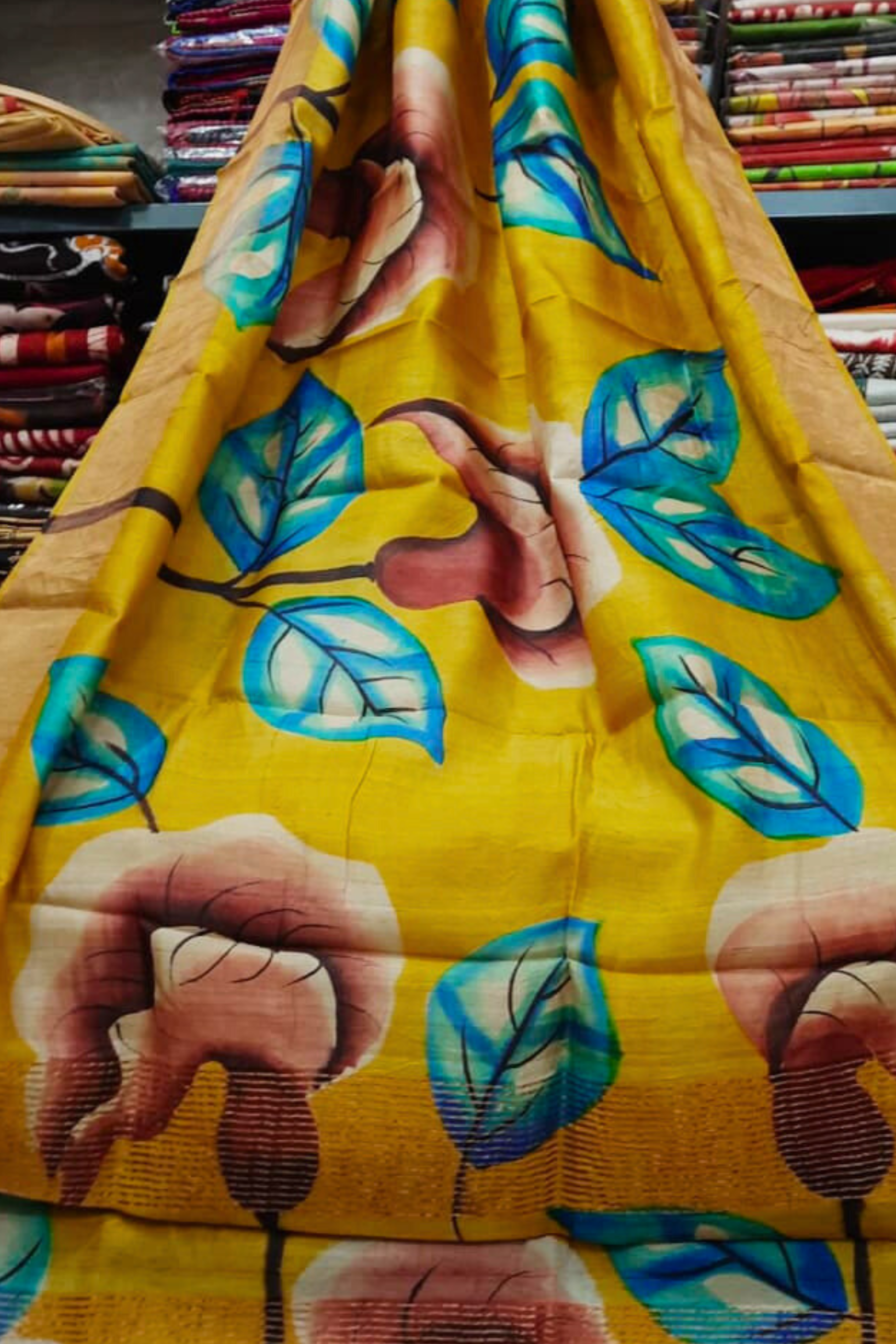 Zari Tussar Pure Silk Saree with Blue Leaf & Abstract Bloom Handpaint on Mustard Base