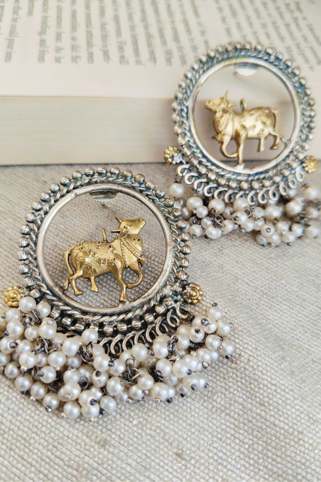 NANDI JI DUAL TONR MOST WANTED SILVERLOOKLIKE STUDS.